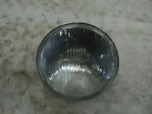 n[[wbhvwbhCg 7' 81-04 c[O P/N: 67755-81A Genuine Harley Headlamp Head Light 7' 81-04 Touring P/N: 67755-81A