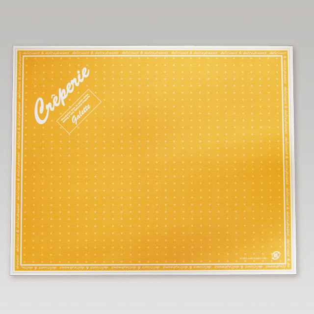 オレンジ色のクレープを包む包装紙。長方形タイプの業務用クレープ包装紙。 クレープ包装紙 ドリームズ柄（四角）3,000枚