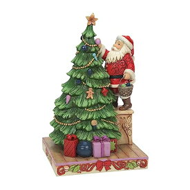 エネスコ Enesco 置物 インテリア 海外モデル アメリカ Enesco Jim Shore Heartwood Creek Santa Decorating The Christmas Tree Figurine, 9.25 Inch, Multicolorエネスコ Enesco 置物 インテリア 海外モデル アメリカ