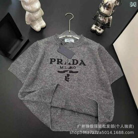 春 夏の 新型 P 家の ニット 半袖の 気質の名 媛の 修身の アルファベットの logoの 軽い 豪華な 丸首は やせて いる 短い 上着を 現します。