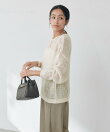 モヘヤブレンドルーズネックニット