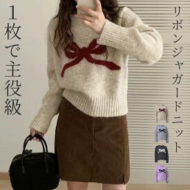 「主張大きめリボン」ジャガード ニット セーター レディース 長袖 トップス 防寒 暖かい きれいめ ミックスカラー バイカラー リボンモチーフ プルオーバー クルーネック 袖口 首元 裾 リブ ラグランスリーブ 伸縮性 厚手 黒 白 秋冬