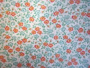 フィードサック 白地オレンジ緑小花 (1/4サイズ)