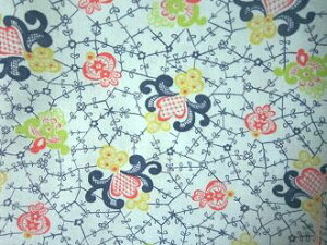 フィードサック 薄ブルー地赤紺黄緑模様 (1/4サイズ)