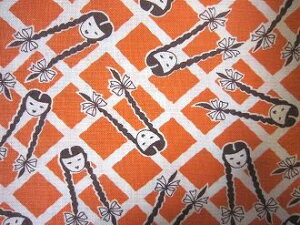 フィードサック オレンジ地おさげの女の子 (1/16サイズ)