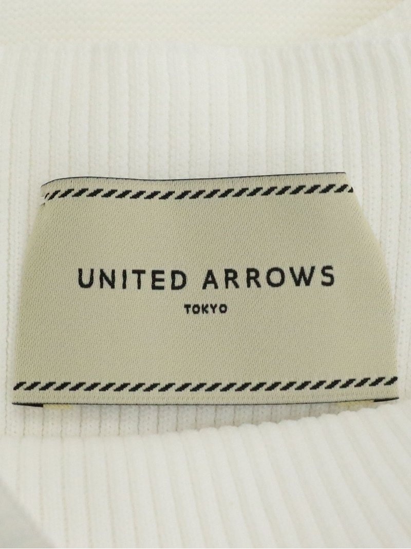 お得なセール価格 P arrows ニット　united ショートスリーブ ペプラム Tシャツ/カットソー(半袖/袖なし)