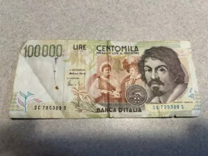 100000�C�^���A��������