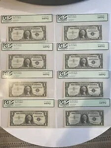 8 X 1957 �A���ԍ��V���o�[�ؖ��� $1 1 �h�� 64PPQ