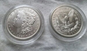 1921�N P�AS�A�܂���D �����K�� AU �V���o�[�h�� $1�B�J�v�Z������R�C��1���o�i