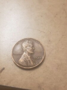 1944�N�����y�j�[�A�~���g�}�[�N�Ȃ��A����L�A����G���[ We Trust ( 05OC )