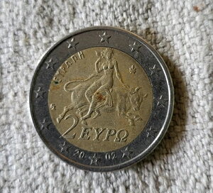 �M���V�� 2 ���[�� 2002 ���A �G���[�R�C�� ���̒��ɁuS�v�̕���