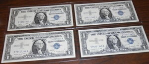 1957�N A $1 �⌔ UNC 4 �������b�g - �e��V���A���ԍ�