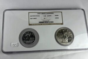 1986�N ���R�̏��_100���N�L�O 100�t���� �s�G�t�H�[�g���V���o�[ $1 COMMEM NGC GEM BU