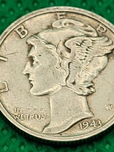 1943�N�_�C���ݕ��i��肠��j�uIn Cod We Trust�v
