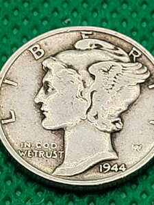 1944�N�_�C���ݕ��i��肠��j�uIn Cod We Trust�v