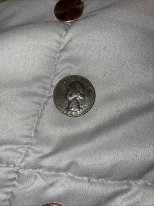 1989 �N�̌�A Quarter In Cod we trust.