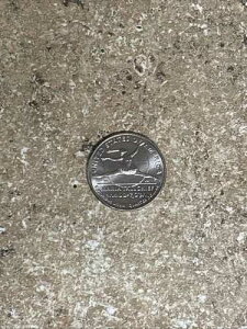 �󏭂ȁuIn Cod We Trust�v�N�H�[�^�[