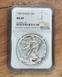 1987�N �C�[�O�� S$1 �V���o�[ �h�� NGC MS69 �u���E�����x�� SKU 6313056-137