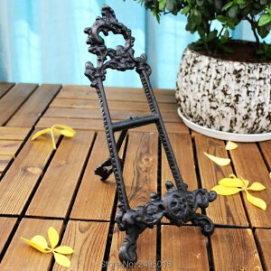 K[fjO Vƃ}KWbNSNGCeBuubNz_[BrO[pIAƂ̑Ãp[\iCYꂽMtg Newspaper and Magazine Rack Cast iron Creative Book holder 