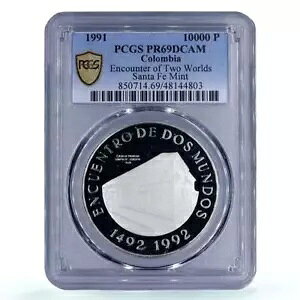 �R�����r�A 10000 �y�\ �c�[ ���[���h �G���J�E���^�[ �T���^�t�F �{�S�^ PR69 PCGS Ag �R�C�� 1991