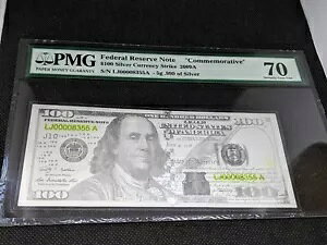 2009 5 Oő 0.999 Vo[ 100 hAMxLO PMG70