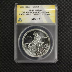 1984 �G���Q���n���g �v���X�y�N�^�[ �V���o�[ ���E���h - �e�N�X�`���[�h E - ANACS MS 67