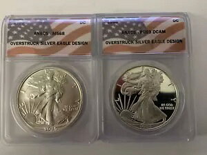1985 D. Carr �I�[�o�[�X�g���b�N ASE �f�U�C�� 1oz �V���o�[ ANACS PR-69DCAM & MS-68