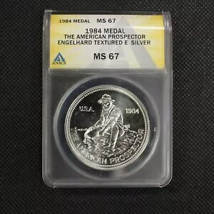 1984 �G���Q���n���g �v���X�y�N�^�[ �V���o�[ ���E���h - �e�N�X�`���[�h E - ANACS MS 67