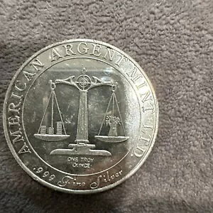 American Argent Mint Ltd ���[���h �g���[�h �V�[���h 1 �I���X .999 �t�@�C�� �V���o�[ ���E���h 241214