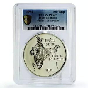 �C���h 100 ���s�[���Ɠ����n�}�� PL67 PCGS ��� 1982
