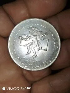 1968 メキシコ 25 ペソ オリンピック銀貨 (ナワトル語の死のゲームをイメージ)