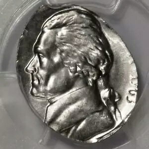 1963 PCGS MS65 �ȉ~�`�̃t�b�g�{�[�� �N���b�v �j�b�P�� �~���g�̔��Ɋ󏭂ȃ��f���ł��B