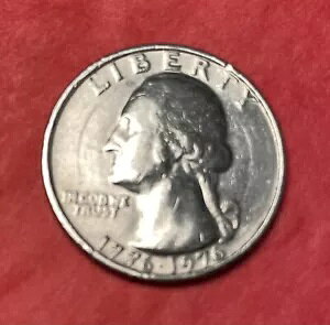 1776 �` 1976 �N�� 200 ���N�L�O�l�����B�~���g�}�[�N�͂���܂���B�������\�ʂ̉~�`�p�^�[��