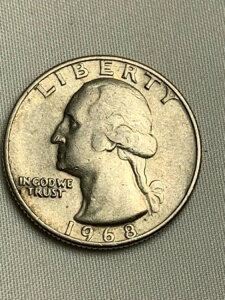 1968�N�N�H�[�^�[�B�~���g�}�[�N�Ȃ��B�R�C���̉��Ɍ�肪����A�uUNITED IN GOD WE TRUST�v�ƋL�ڂ���Ă��܂��B
