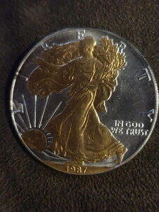 1987�N�A�����J���V���o�[�C�[�O���h���A1�I���X .999 ���� $1�A�����t���č��R�C��