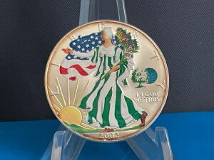 2002年 1オンス シルバー ウォーキング・リバティ。色彩豊かで惑星と木のプライベートな空間。