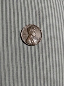 1965�N�A�~���g�}�[�N�Ȃ��̃y�j�[�R�C���B�������uL�viberty�ƁuWe trust�v�̃G���[����B1�Z���g�d��