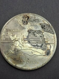 ���L�ɗn��l���L�ڂ���Ă��܂� ���j 1976�N �����g���I�[���I�����s�b�N 10�h�� 1.44�I���X .925��