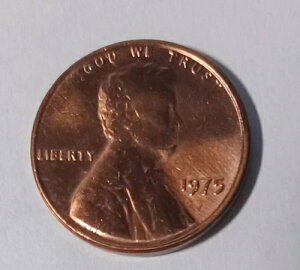 �󏭂�1975�N�����J�[���E�y�j�[�B�uIn�v�݂̂������B�uGod We Trust�v�̑傫�ȔN���v�����g