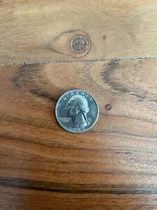 �����A�ȃA�����J�̃R�C�� 1980�N 25�Z���g