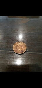 ジョージ・ワシントンの1ドル硬貨(汚れあり)