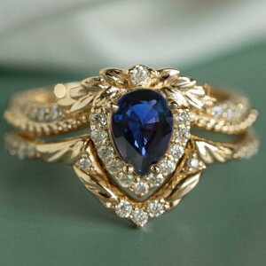 指輪 レディース 結婚指輪 ウェディングリング ブライダルリング 王冠 クラウン フラワーモチーフ 花 ブルー 雫 ティアドロップ ジルコニア リング 重ね付け ゴールドカラー 合金製 結婚式