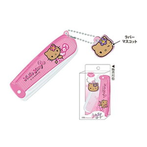 サンリオ ハローキティ 日焼けシリーズ マスコット付き前髪カプセルコーム リボン ピンク 折りたたみ ヘアブラシ くし Sanrio クラックス 代引不可商品
