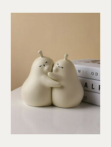 梨 抱きしめ かわいい 萌え おしゃれ 置物 オブジェ 本棚の飾り ブックエンド 本立て ペア 磁器製 白い インテリア 雑貨